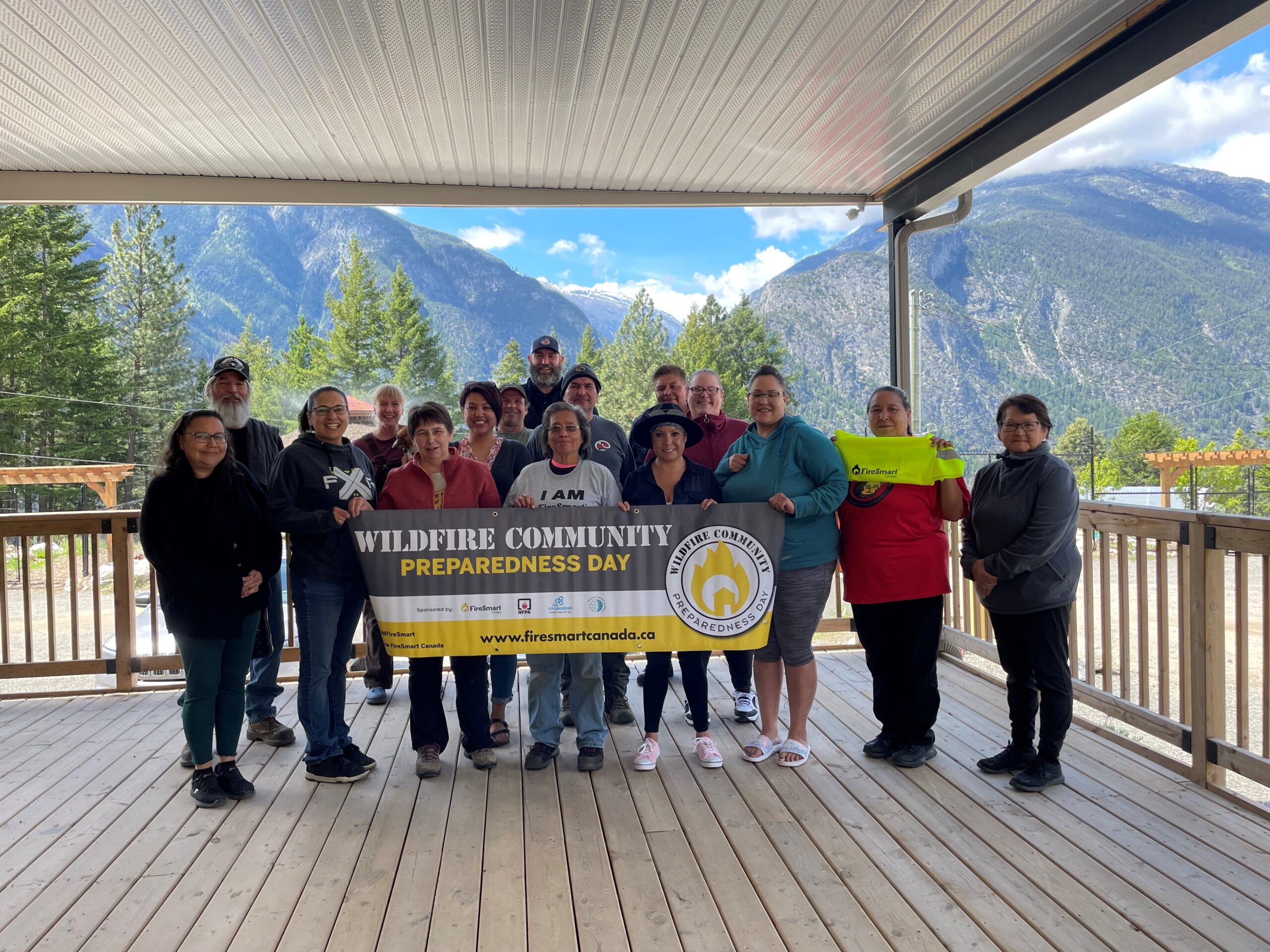 Attendees of the Wildfire Preparedness Day presentation pose for a photo.